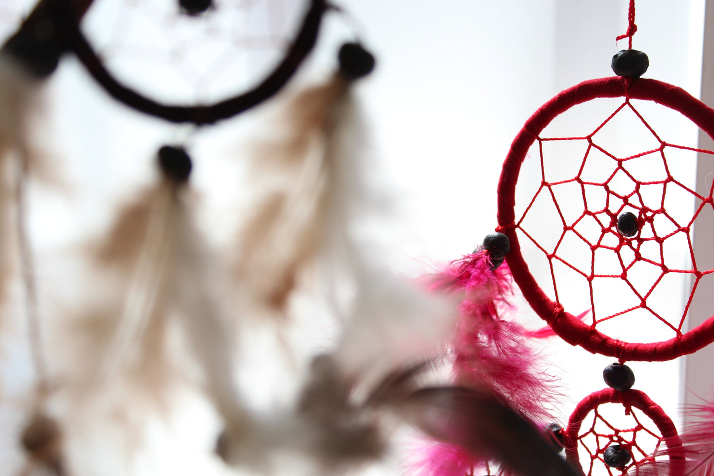 Alt Tag: Synthetic Suede Dream Catcher – Large 17CM Round with red hoop, web design, feathers and beads hanging decor