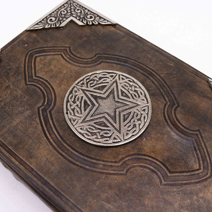 Tan Leather Notebook – Zinc Pentagon 26x18 CM close-up of tan leather cover with zinc pentagon-style metal decor
