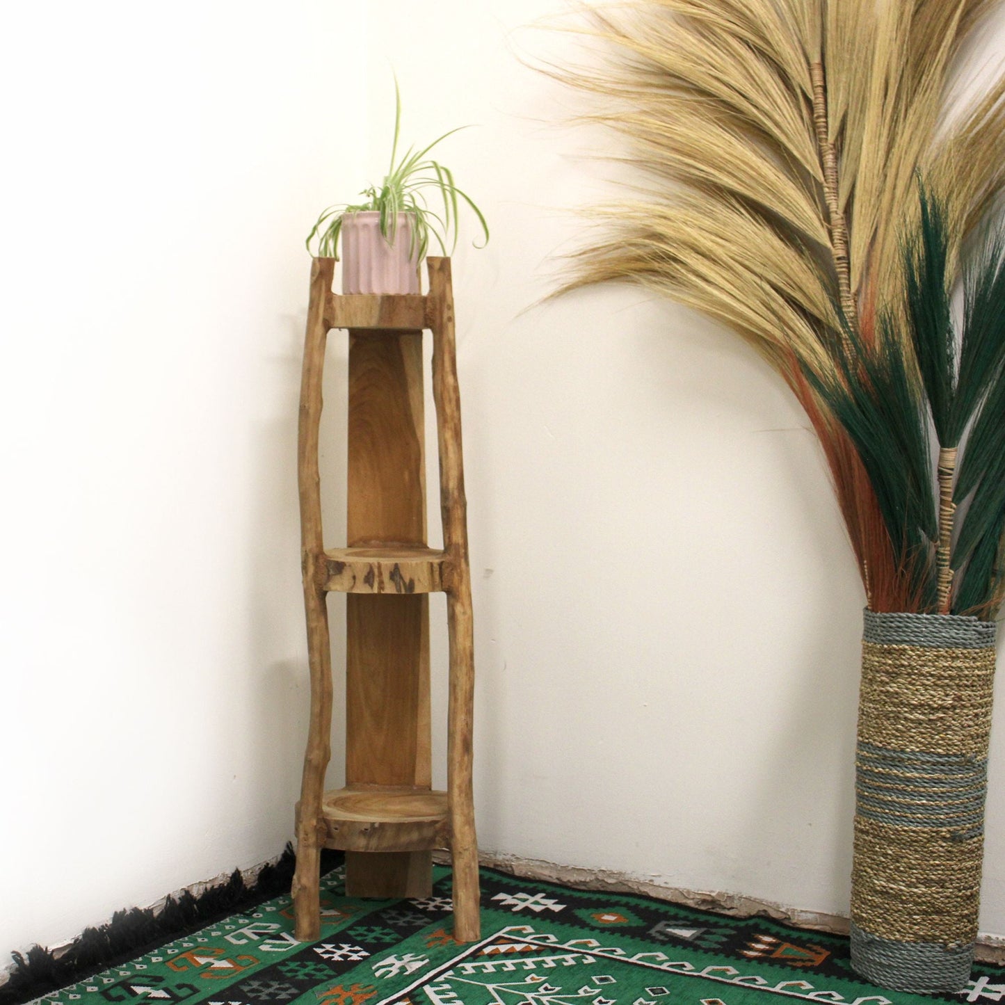 Alt Tag: Teak Wood Display Unit – 90CM Corner Shelves in corner, 3-tier teak display stand with plant pot, natural wood finish