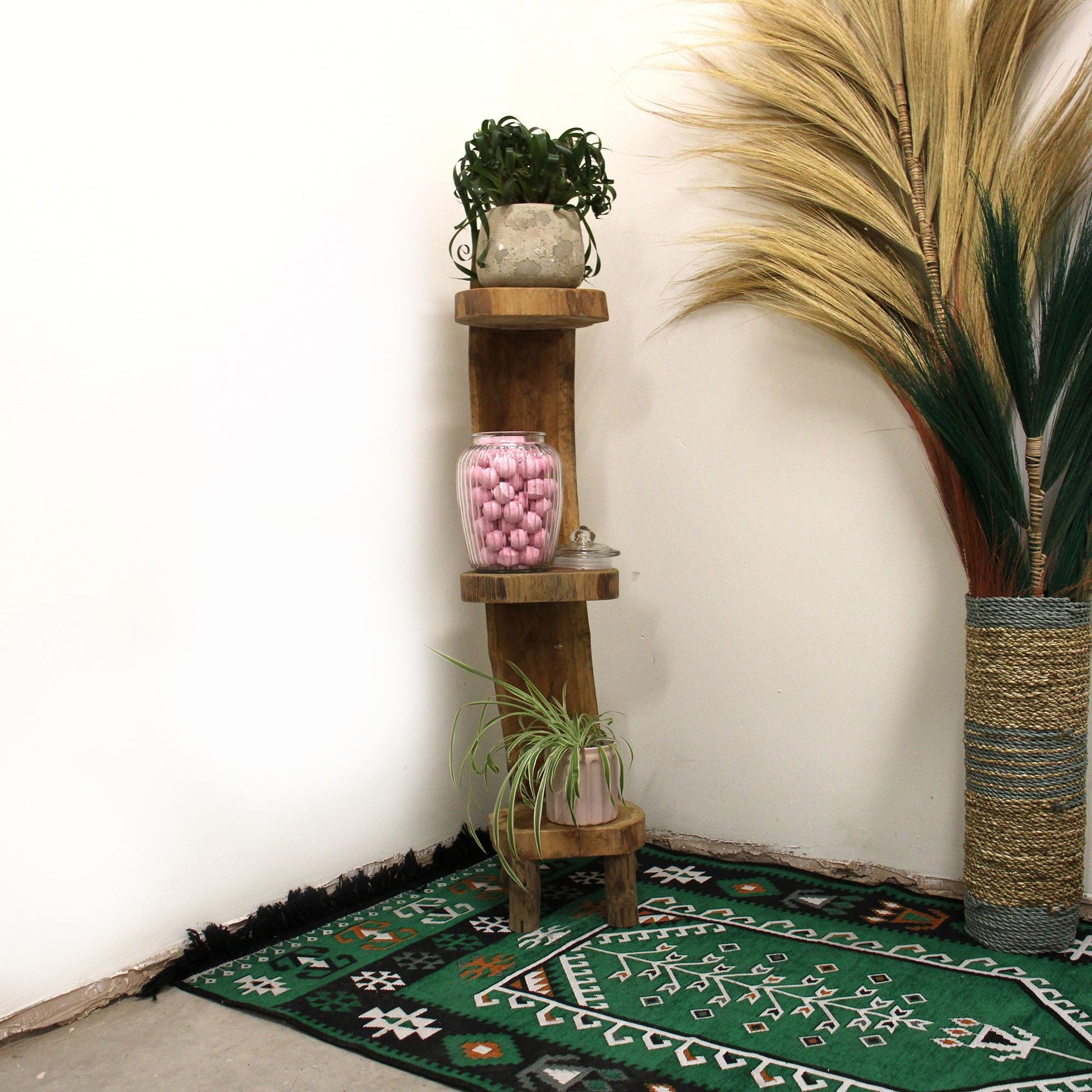 Alt Tag: Teak Wood Display – 3 Shelves, 100CM vertical teak shelf stand with three tiers displaying decor in living room corner