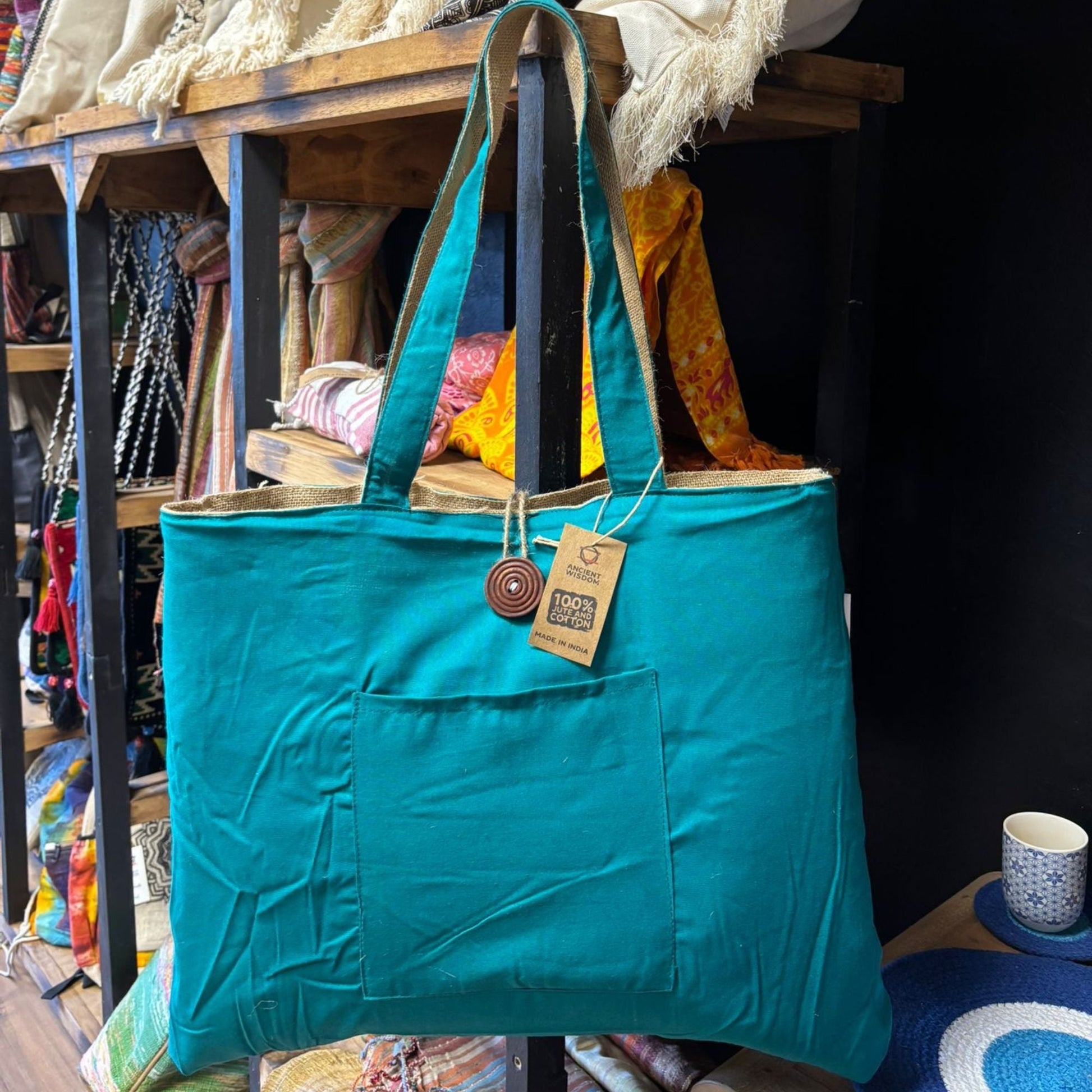 Teal Reversible Jute & Cotton Bag – 49x40 CM teal reversible tote bag with long handles, spacious design and front pocket