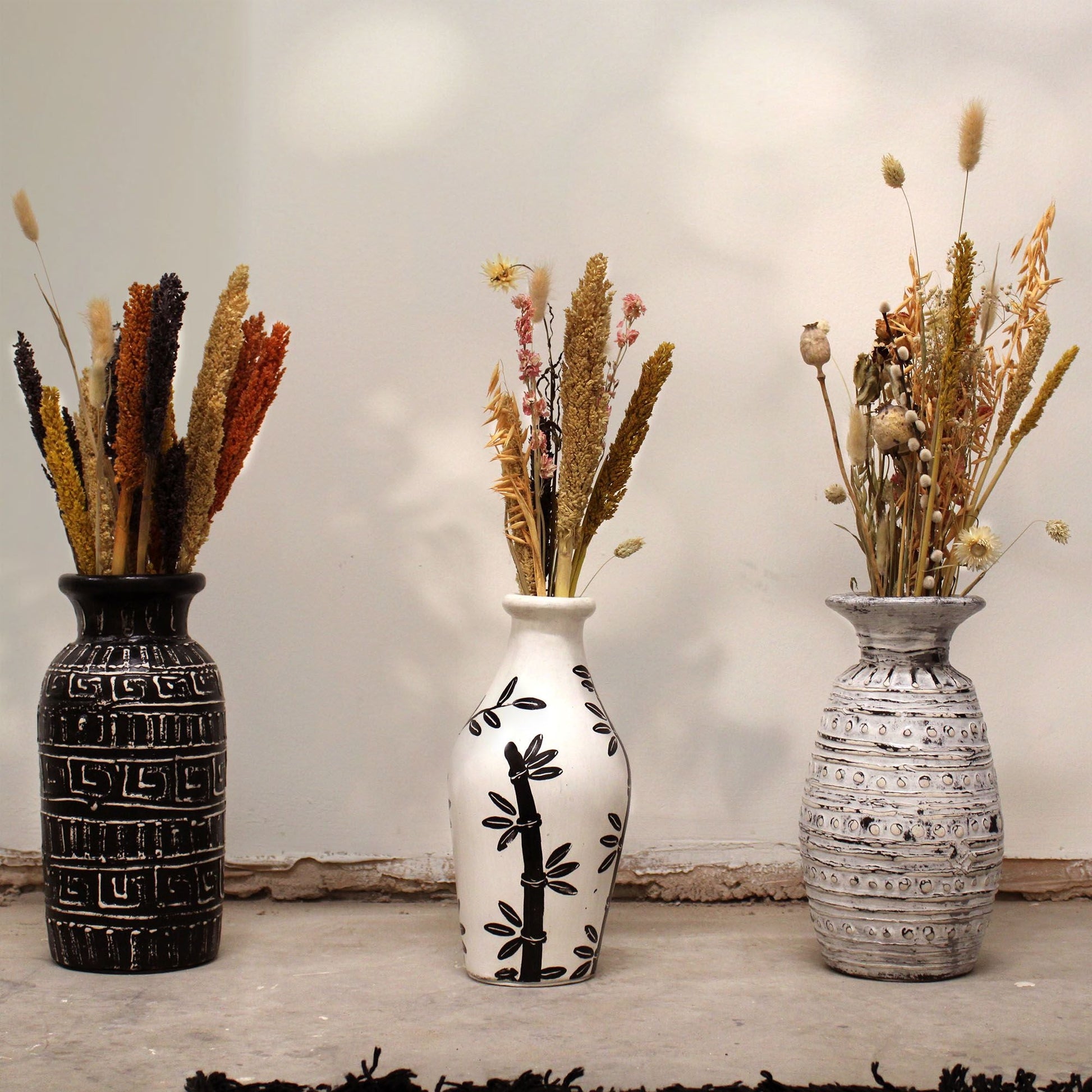 Terracotta Bamboo Motif Vase – 30x14 CM with bamboo motif design, decorative terracotta vase styled with dried flowers