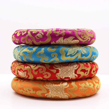 Alt Tag: Textile Polyester Hoop Cushion – 24CM brocade singing bowl ring cushion set, stacked in pink, blue, red and orange