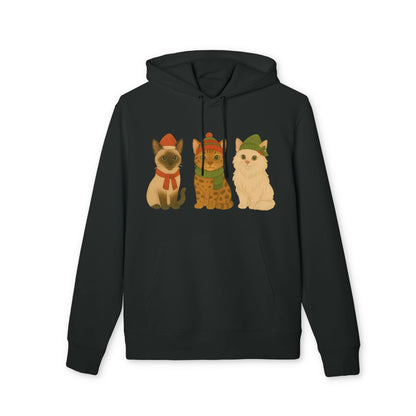 Three Little Cats Christmas Premium Unisex Hoodie black hoodie with three cats in festive winter hats and scarf graphic