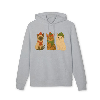 Alt Tag: Three Little Cats Christmas Premium Unisex Hoodie gris con ilustración de tres gatos festivos con gorros navideños