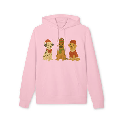 Three Little Dogs Christmas Premium Unisex Hoodie en color rosa con ilustración de tres perros con gorros navideños en el pecho