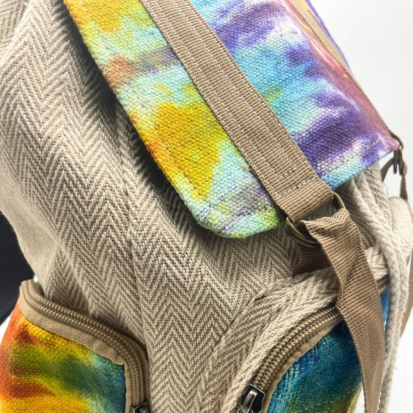 Tiedye Hemp Large Square Backpack close-up of hemp and cotton fabric with tie-dye pocket, zipper and strap detail