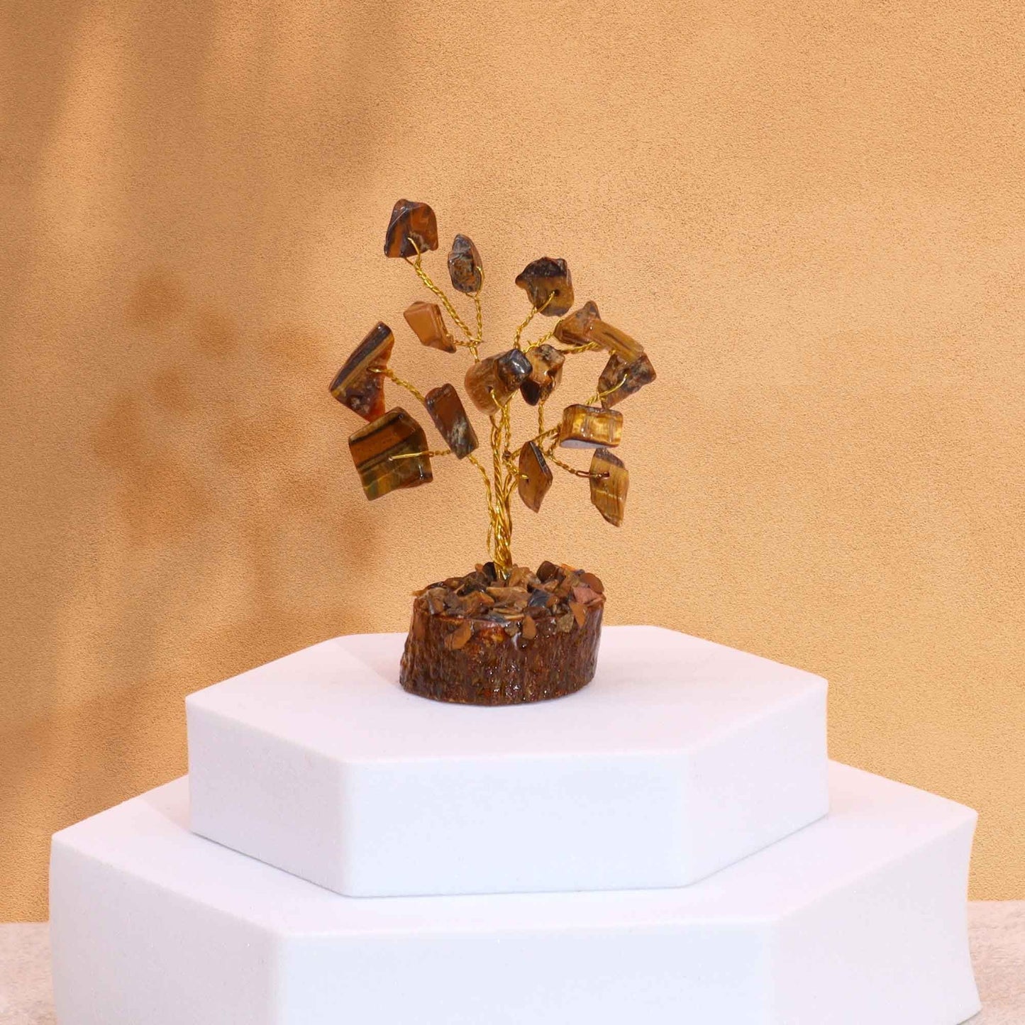 Alt Tag: Tiger Eye Gemstone Tree – 15 Sparkling Stones mini gemstone chipstone decor tree on white display stand