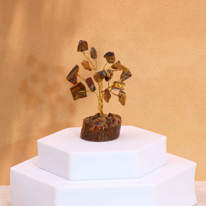 Alt Tag: Tiger Eye Gemstone Tree – 15 Sparkling Stones mini gemstone chipstone decor tree on white display stand
