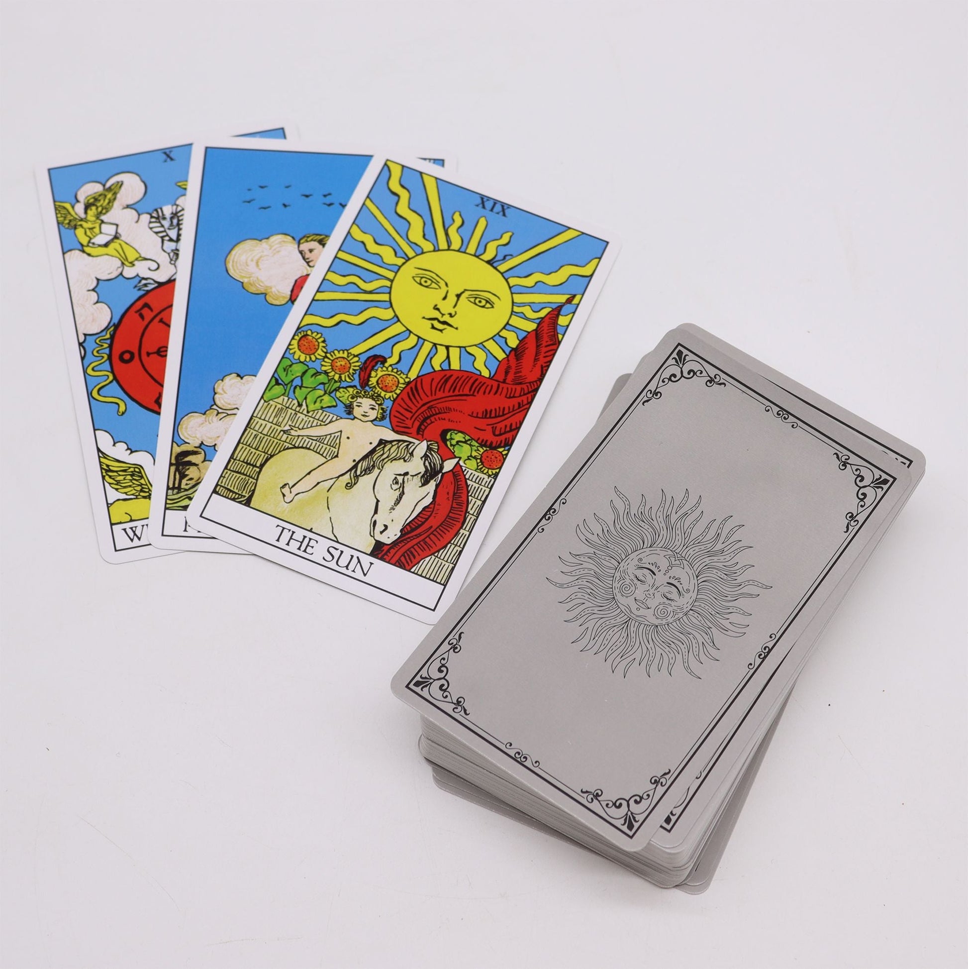 Alt Tag: Traditional Arcana Tarot Cards – Guide Book Set, Rider–Waite tarot deck with The Sun card shown, 78-card set on smooth-finish paper