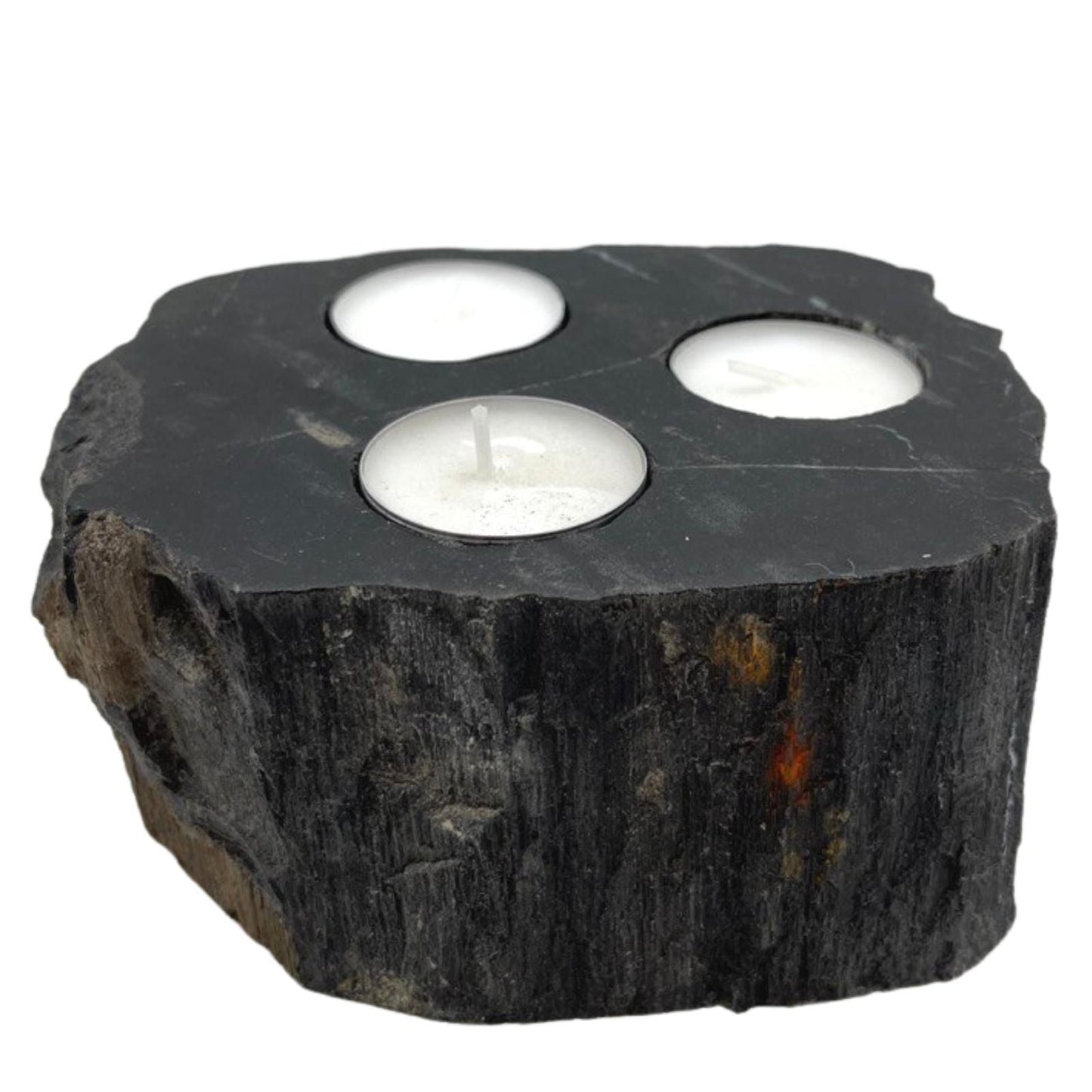 Alt Tag: Triple Petrified Wood Candle Holder – Natural Stone, dark petrified wood slab with three tea light candle holders