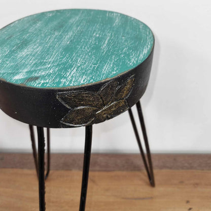 Alt Tag: Turquoise Albasia Wood Plant Stand – Gold Detail, turquoise round albasia wood top with gold detail and black metal legs