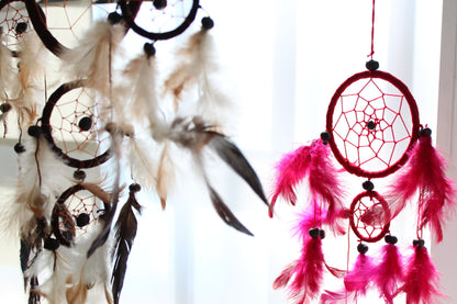Alt Tag: Turquoise Pink Purple Dreamcatcher – Small Round hanging by window with pink feathers and circular web design