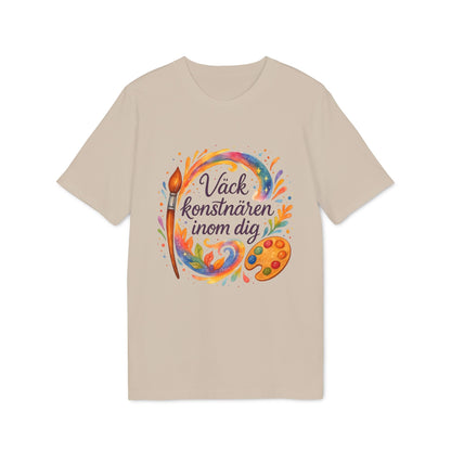 Alt Tag: Väck Konstnären Inom Dig Waldorf Sustainable Unisex Tee med färgstark pensel- och palettillustration på beige t-shirt