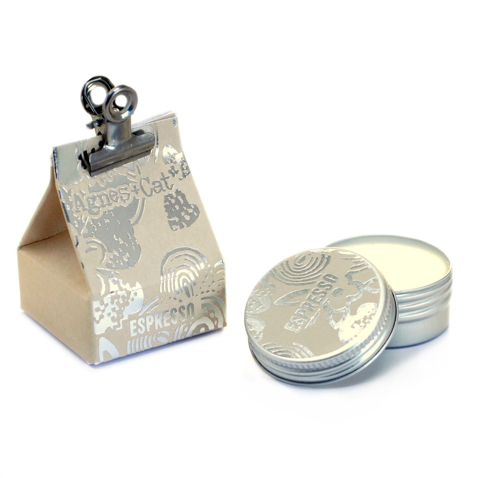 Vegan Espresso Martini Lip Balm – 12G in metal tin with lid, shown beside branded product packaging on white background