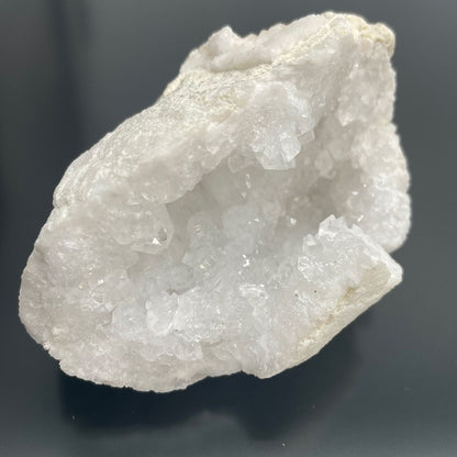 Vibrant Calcite Mineral Specimens – Approx 32 Pieces, white calcite crystal cluster specimen close-up on dark background