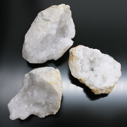 Vibrant Calcite Mineral Specimens – Approx 32 Pieces, white calcite crystal chunks close-up on dark background
