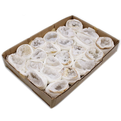 Alt Tag: Vibrant Calcite Mineral Specimens – Approx 32 Pieces in a cardboard tray, white calcite crystal geode halves wrapped in tissue