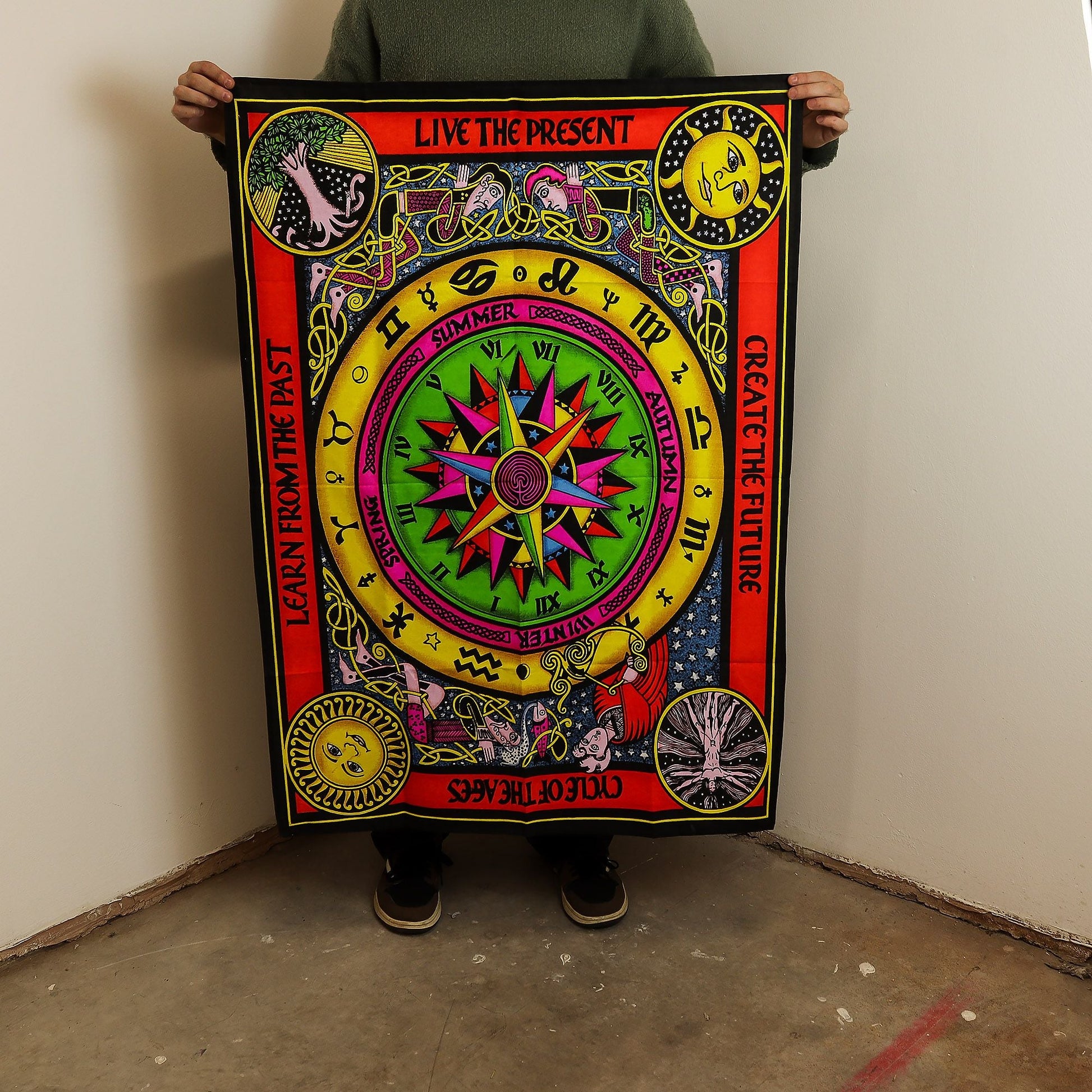 Alt Tag: Vibrant Cotton Circle of Life Art – 70x110 CM colorful cotton wall hanging with compass-style circle design and "Live the Present" border