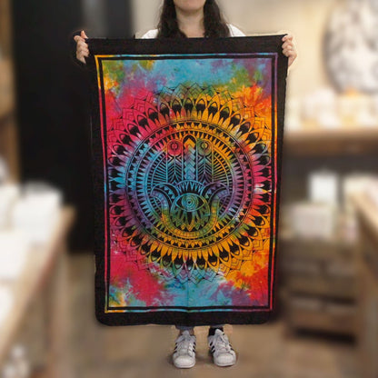 Alt Tag: Vibrant Cotton Wall Art – Hamsa Hand 78x112 CM colorful mandala Hamsa hand cotton wall hanging tapestry held up indoors