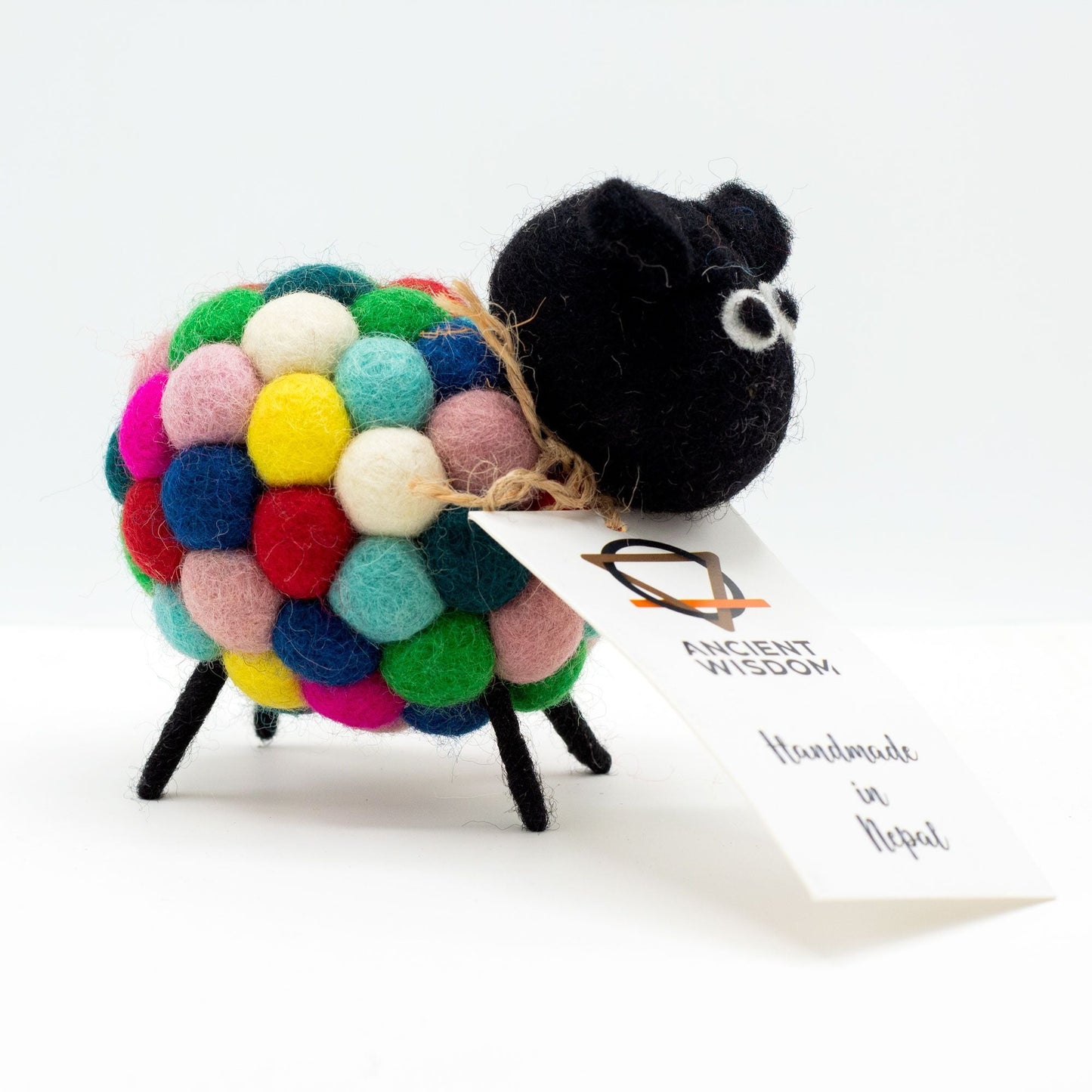 Vibrant Felt Sheep – Multi Colours, 12x8x10 CM handmade felt sheep decor with colorful wool body and black head on white background