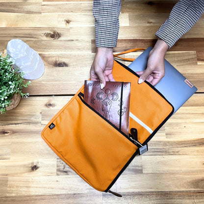 Vibrant Orange Canvas Laptop Pouch – 24x33 CM with notebook and tablet inside, orange canvas case with zipper and inner pocket
