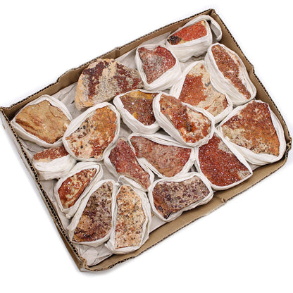 Alt Tag: Vibrant Vanadinite Mineral Specimens – Approx. 20 Pieces in tray, orange-red crystal clusters wrapped for shipping