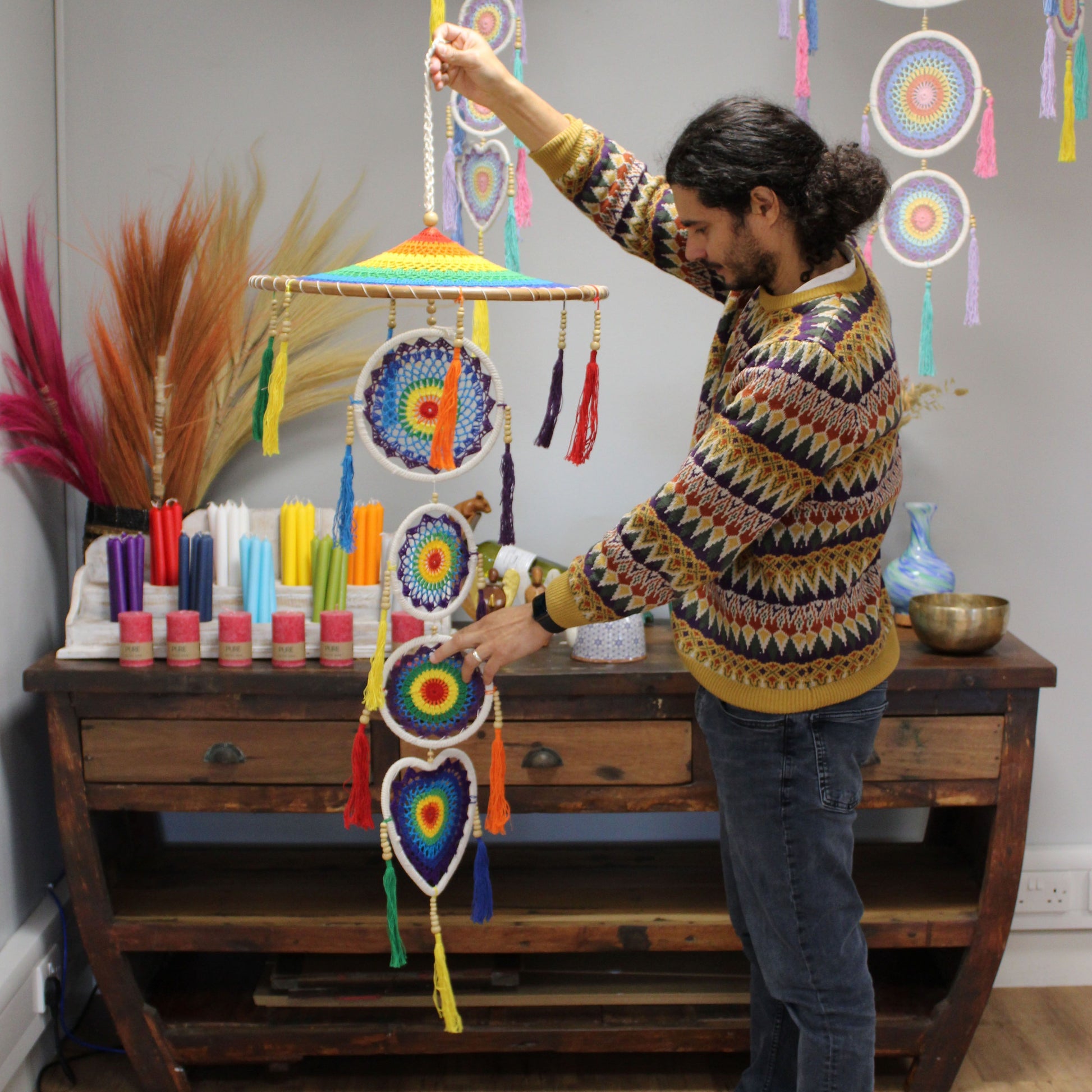 Vivid Rainbow Dreamcatcher – Extra Large hanging wall decor with colorful woven circles and tassels in creative room setting