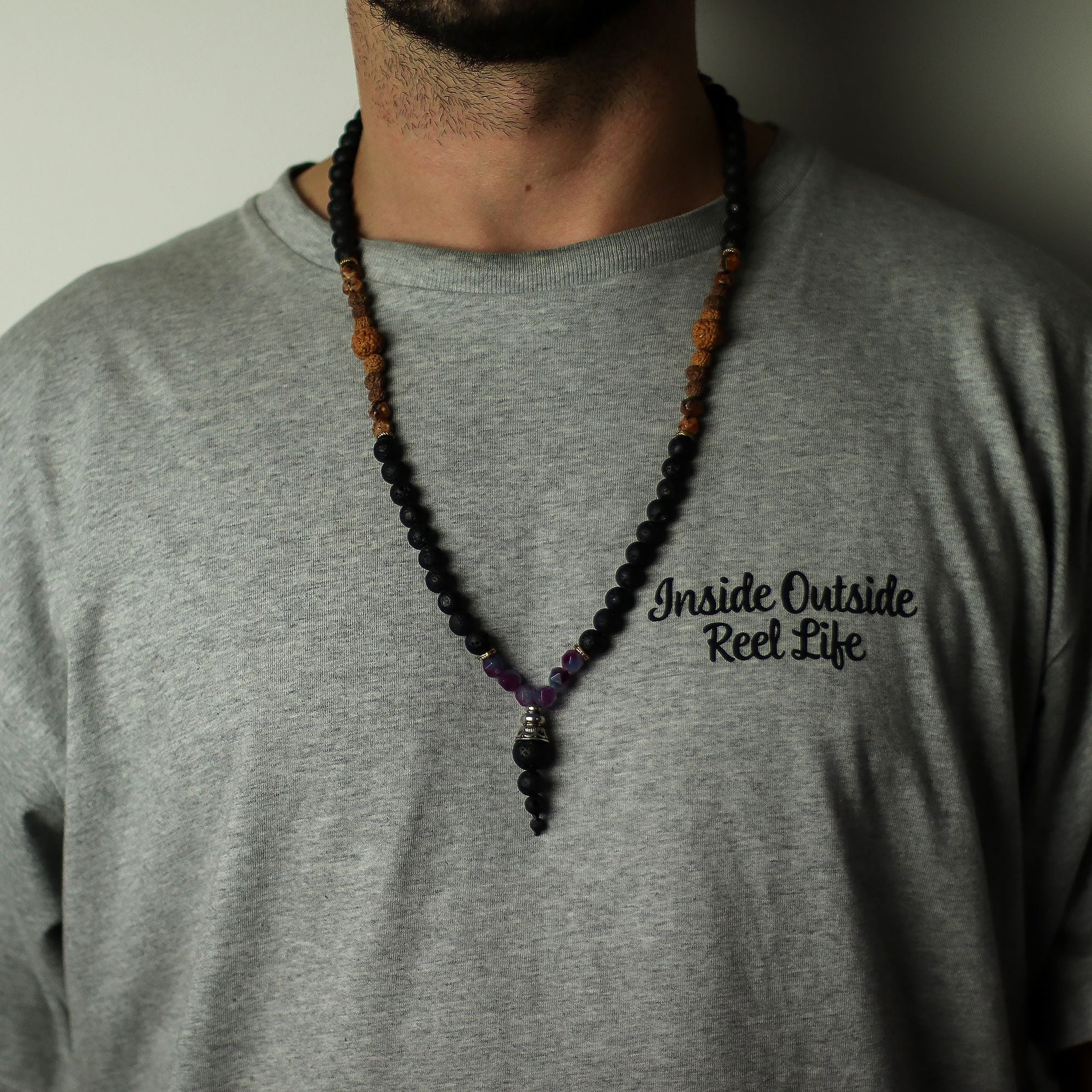 Volcanic & Gemstone Necklace – Embrace Dark Side on model, black volcanic bead and gemstone necklace with pendant