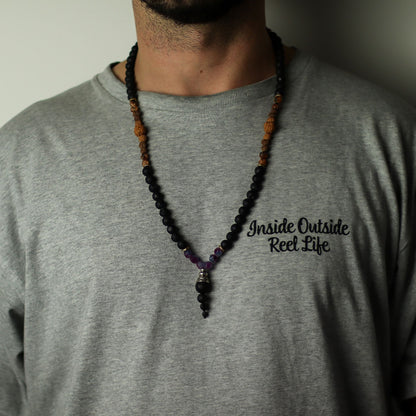Volcanic & Gemstone Necklace – Embrace Dark Side on model, black volcanic bead and gemstone necklace with pendant