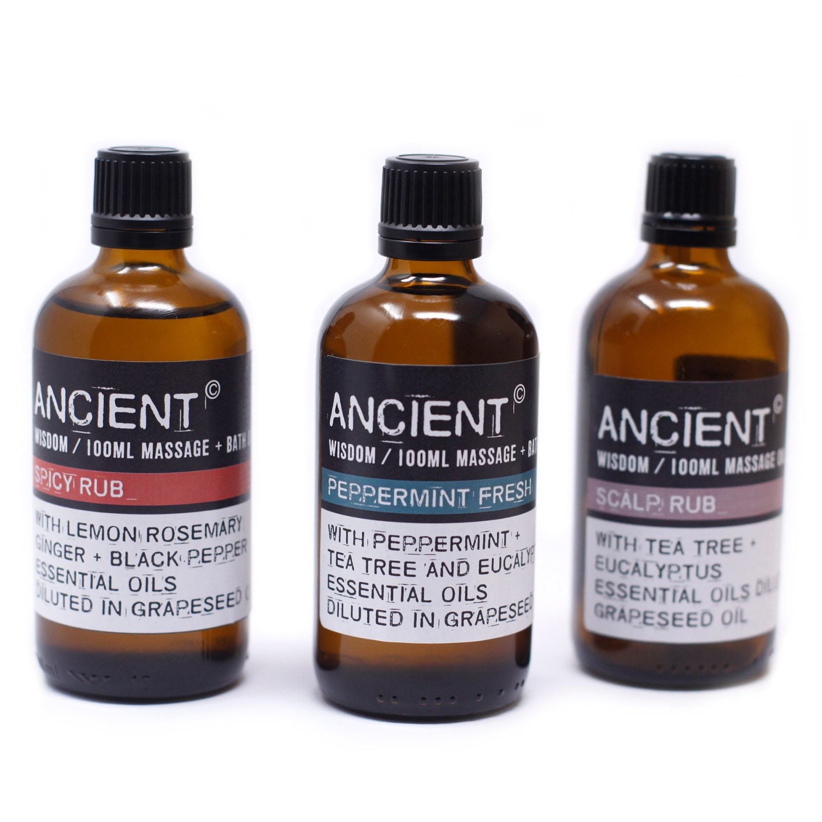 Warm & Uplifting Massage Oil – 100ML en botella ámbar con etiqueta, aceite de masaje con limón, enebro, jengibre e ylang ylang