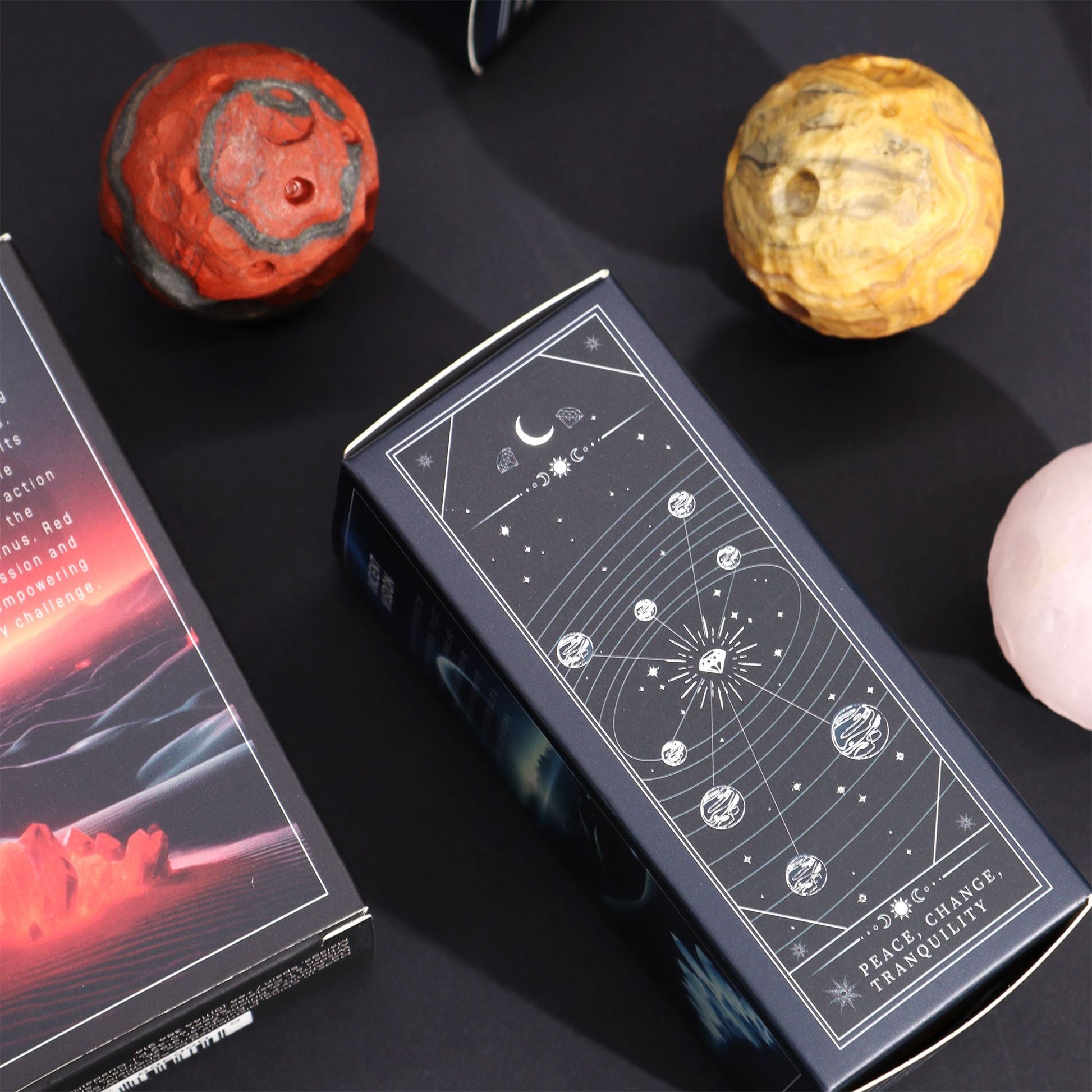 Alt Tag: White Howlite Gemstone Planet – 40MM Solar Goldstone Stand product box with celestial moon and planet design