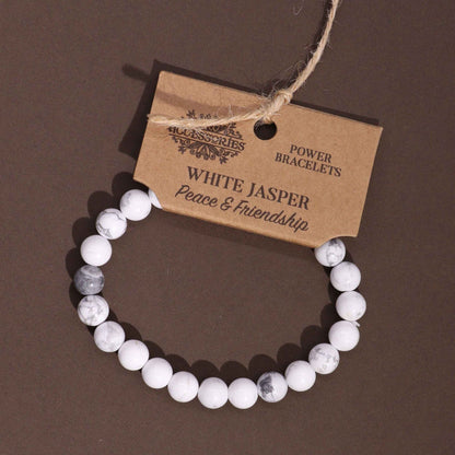 Alt Tag: White Jasper Gemstone Bracelet – 8MM white jasper round bead stretch bracelet with product tag on brown background