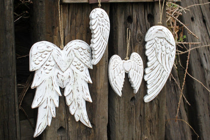 White Washed Angel Wings – 31CM hanging white-washed carved wooden angel wing wall decor set on rustic wood background