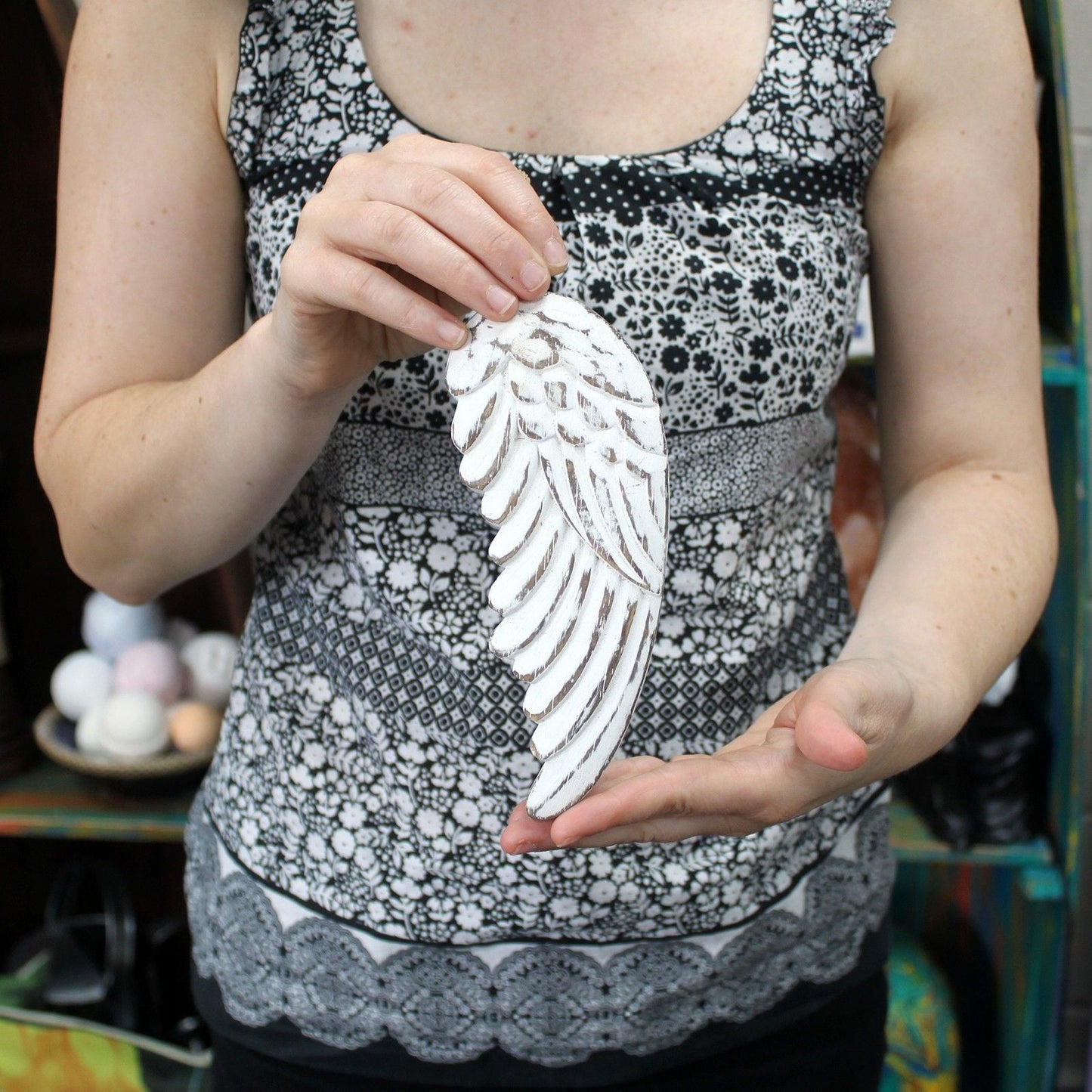 Whitewashed Albesia Wood Angel Wings – 18CM handcrafted whitewashed wooden angel wing decor held in hands