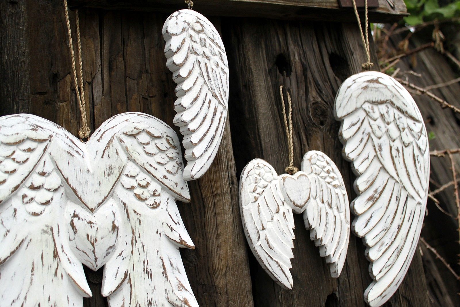 Whitewashed Albesia Wood Angel Wings – 18CM handcrafted carved wooden angel wing wall decor hanging on rustic wood background