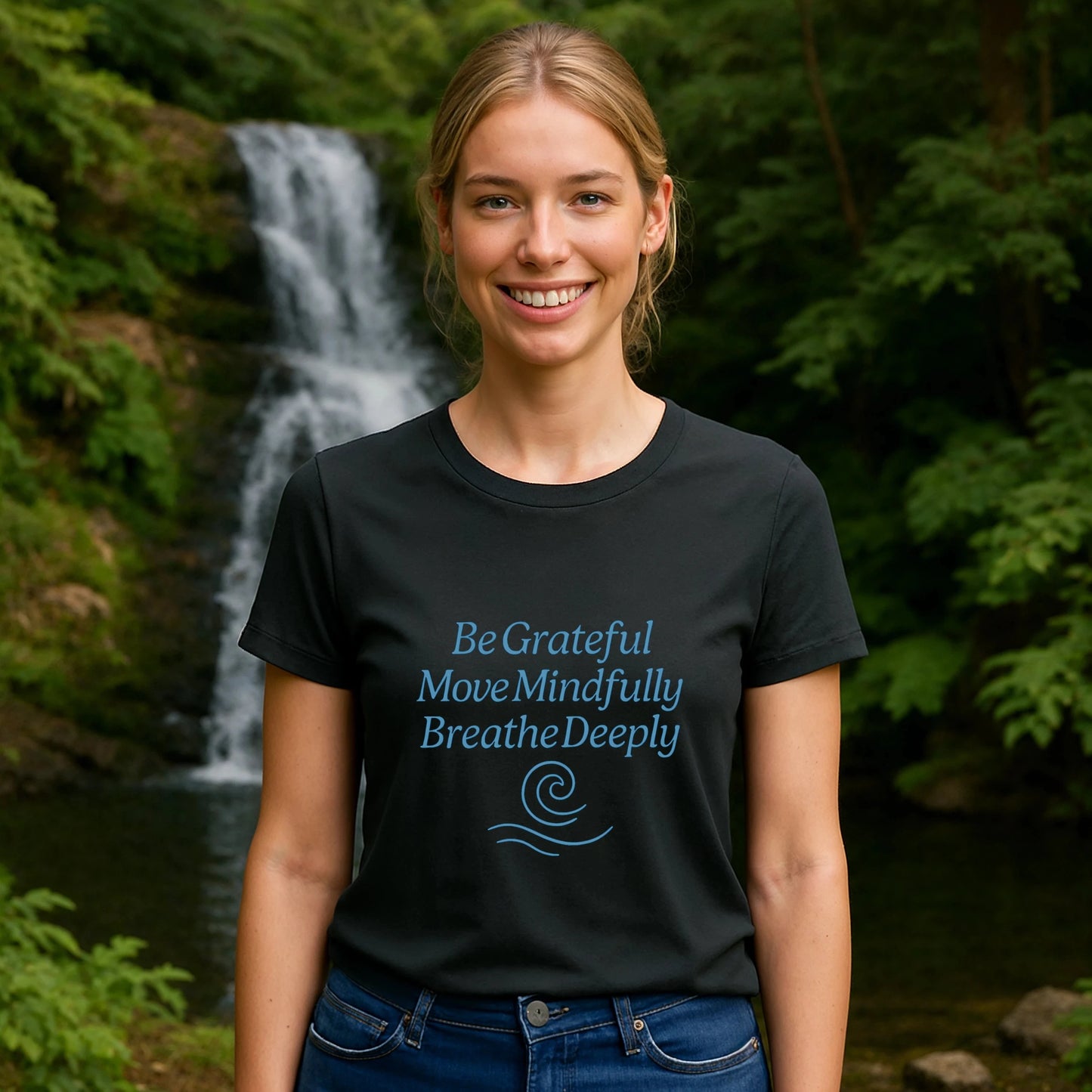 Alt Tag: Yoga 100% Organic Cotton T-Shirt worn by woman outdoors near waterfall, black tee with mindful quote graphic
