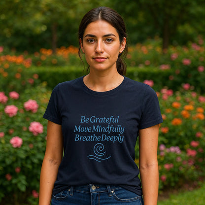 Alt Tag: Yoga 100% Organic Cotton T-Shirt navy graphic tee worn by woman, “Be Grateful Move Mindfully Breathe Deeply” print