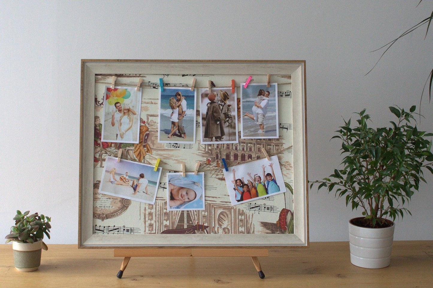 Wooden DIY Peg Photo Frame – 50x60 CM with clips displaying family photos on a tabletop easel stand